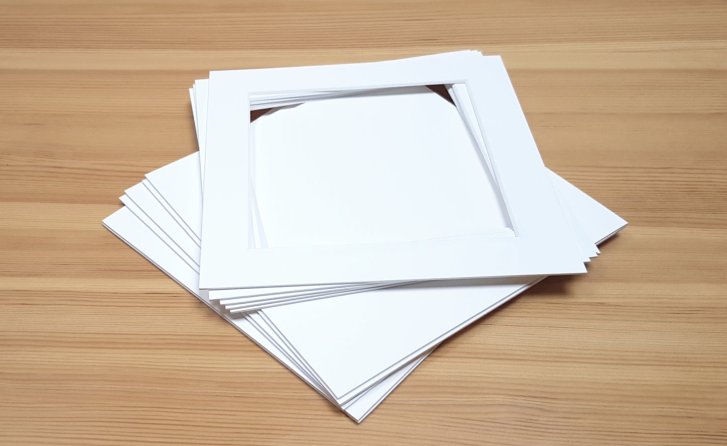 Pack of 5 square picture window photo mounts with backing boards. Conservation grade, acid-free, pH neutral, white-core mount board.