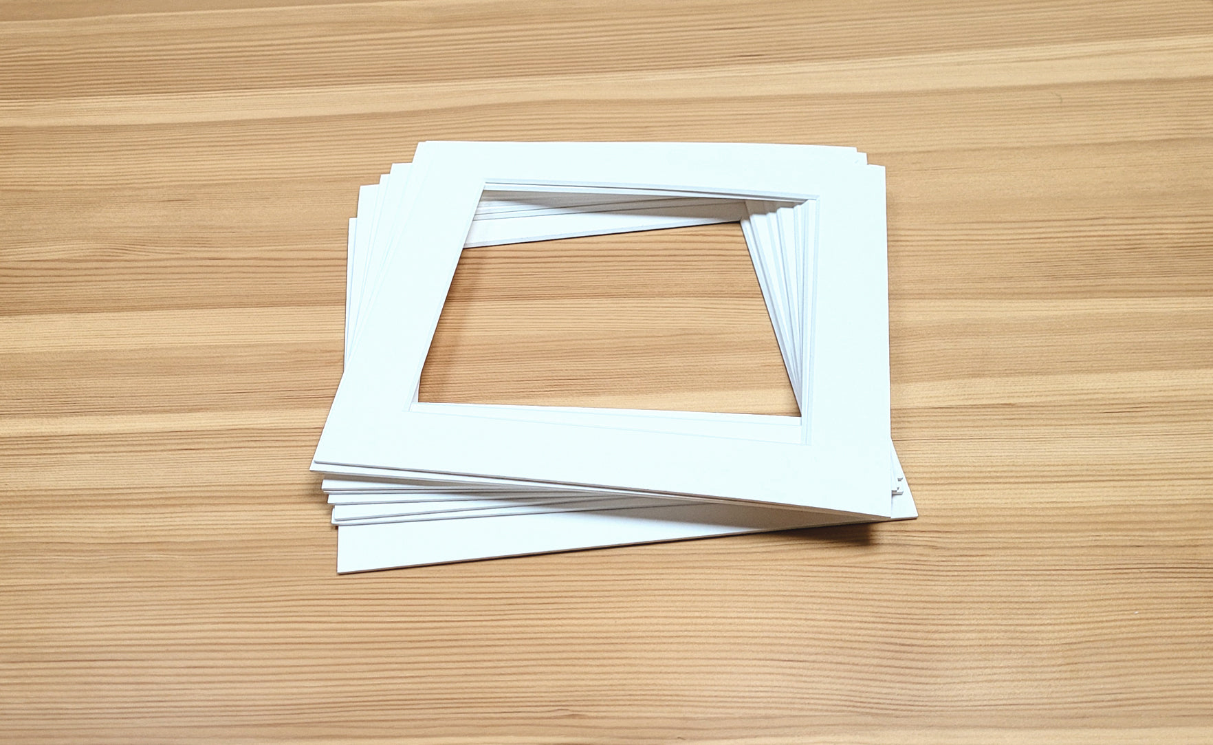 Pack of 10 standard size square picture window photo mounts.