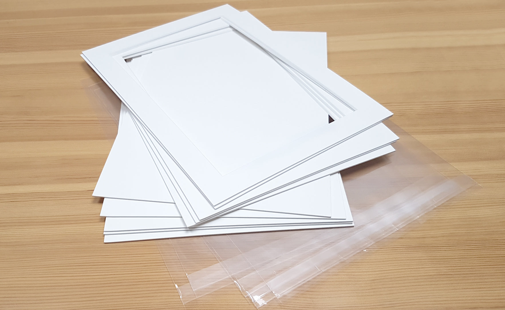 Pack of 5 standard size picture photo mounts with backing boards and cellophane bags